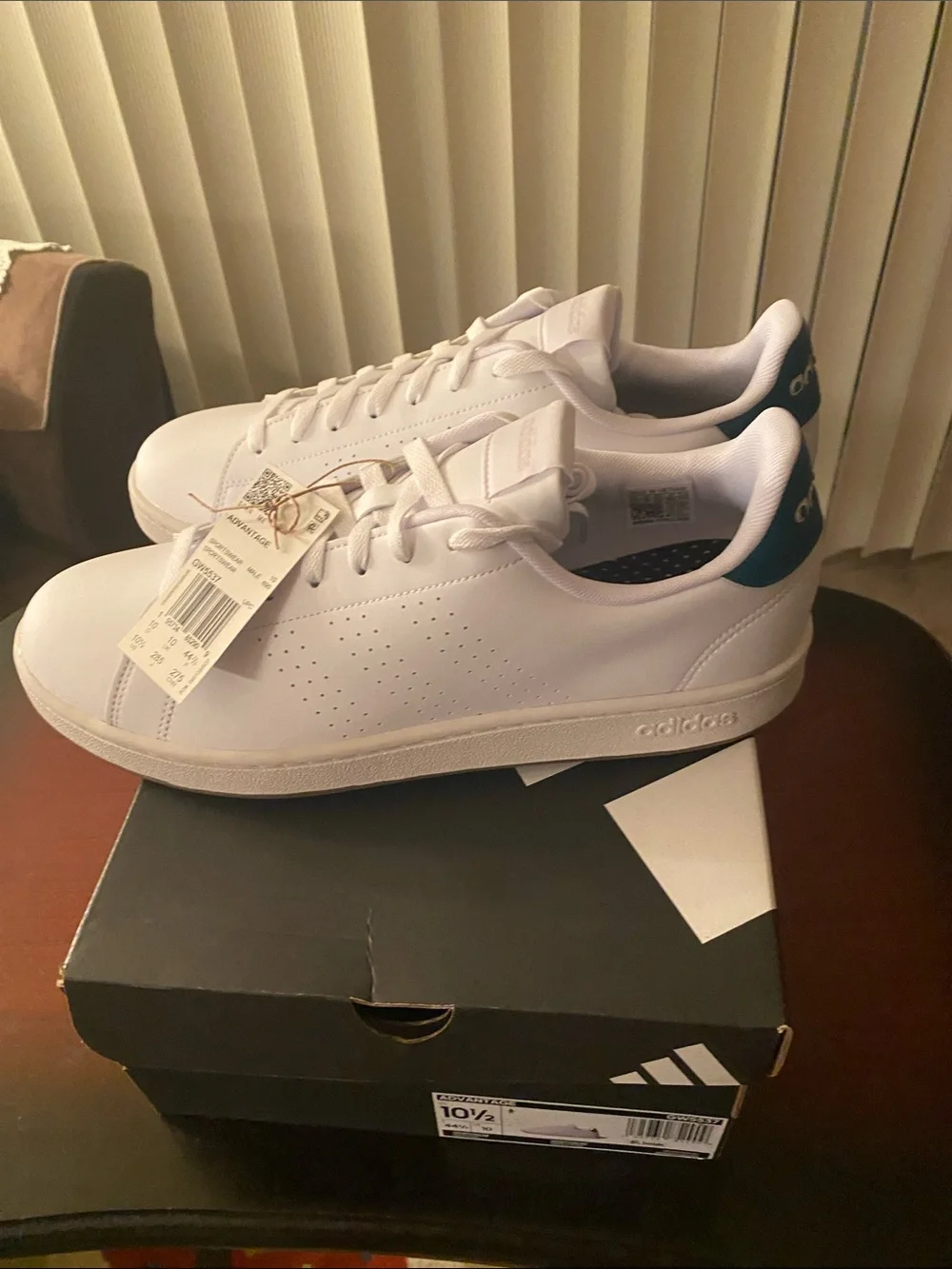 adidas Men’s All-White Leather Casual Sneakers